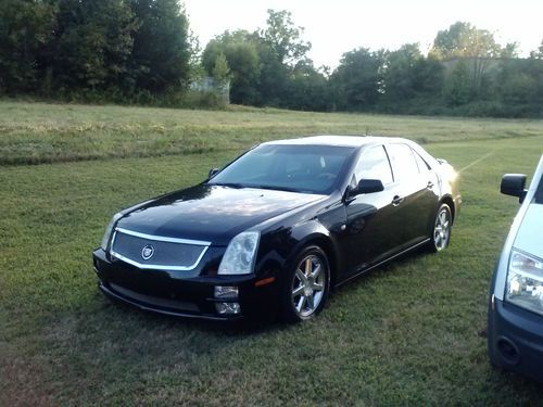 2005 cadillac sts nav,leather, sunroof, low miles.. nr