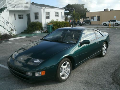This is a green 2+2 coupe  excellent condition  rare find  and low miles