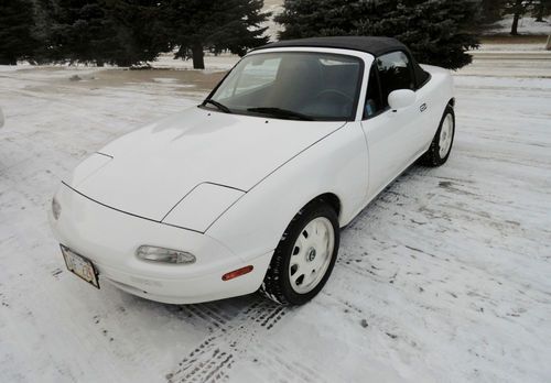 One owner white 14k miles convertible soft top no accidents