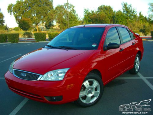 2005 ford focus zx4 ses 4-door red,? 69k miles, very clean, low cost gas saver ?