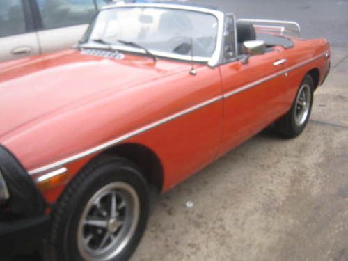 1975 mg covertible plus hard top very good condition with extras no reserve