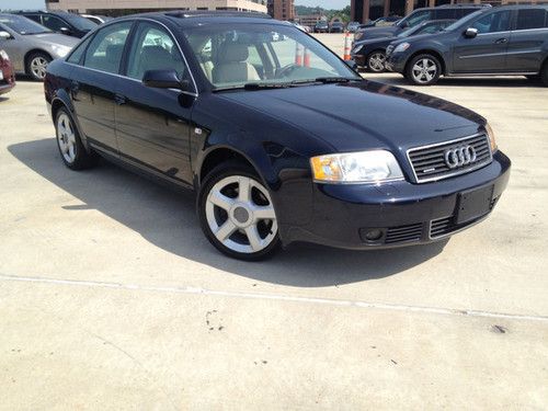 Quattro leather alloys onstar front and rear heated seats sunroof bose sound