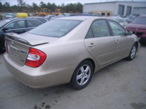 2002 toyota camry le/x only 82k miles leather  runs/drives salvage rebuildable