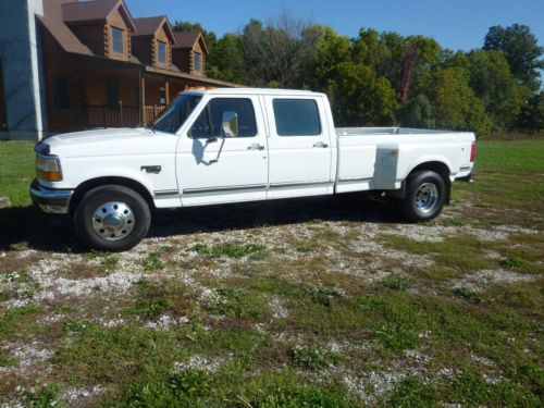 Ford f350 xlt dually crew cab 7.3 power stroke  very low milage lots of extras