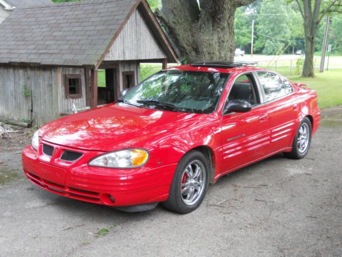 1999 pontiac grand am - bright red - rebuilt top end of engine - really nice car