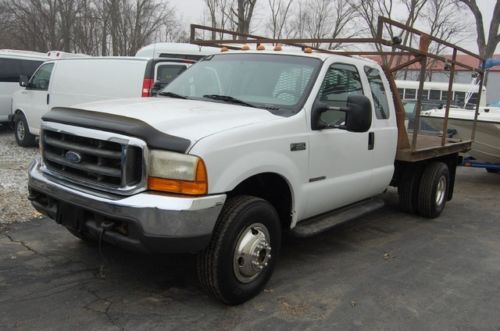 7,3 powerstroke diesel 4x4 diesel xcab flatbed auto dually tow pkg solid used