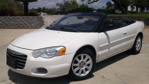 2004 sebring gtc convertible, low miles, leather, nice, runs and drives great!!!