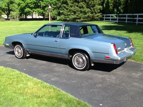 1985 oldsmobile cutlass supreme base coupe 2-door 5.0l