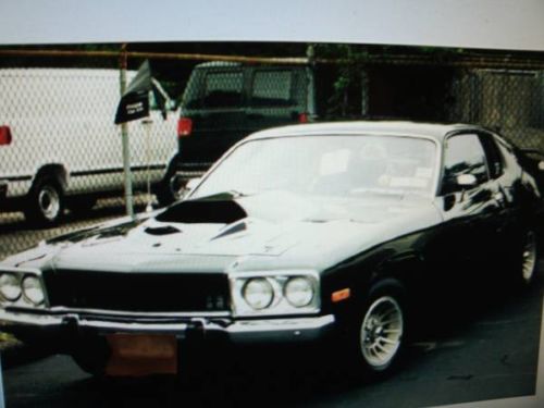Black 1974 plymouth roadrunner only 100 made of the 400 cu. 4spd pistol grip