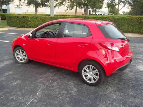 Mazda 2 touring edition just off lease red 29000 miles