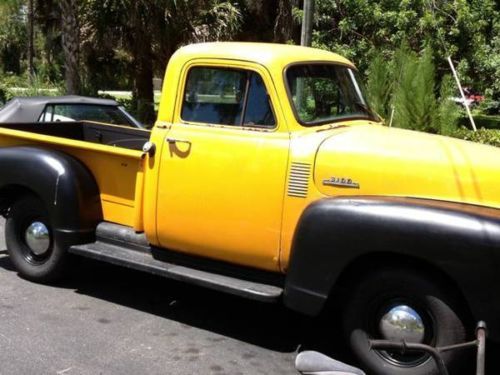 Yellow/black 2 door 1954 chevrolet 3100 truck