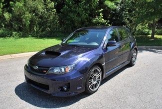 2011 blue sti wagon 6 speed manual only 2600 actual miles like new no reserve