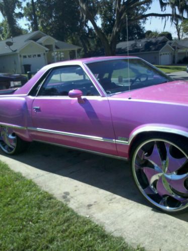Outrages paint job ; with 26in. rims...