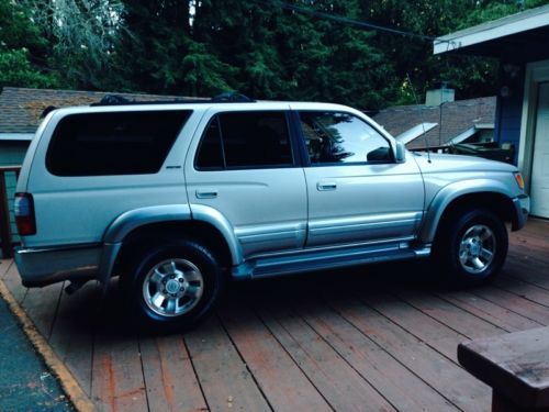 1997 toyota 4runner limited; silver, leather, excellent running, some body dmg.