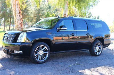 Beautiful black suv loaded leather, 3rd row seating, rear ac, tv/dvd, 22" wheels