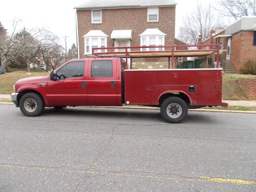 2003 ford f350 crew cab w/9ft reading body and racks light body repair