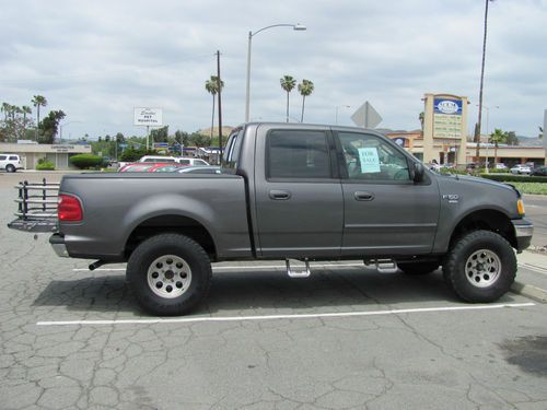 2003 ford f150  v8 super crew xlt loaded 6" lift l@@k!