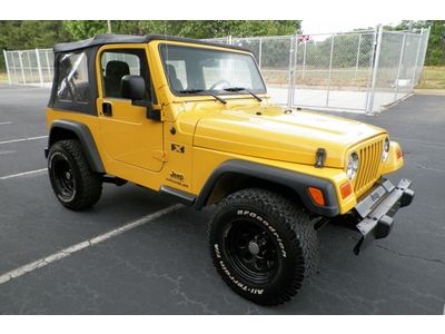 Jeep wrangler se 4x4 6 speed manual soft top 70k miles runs good no reserve only