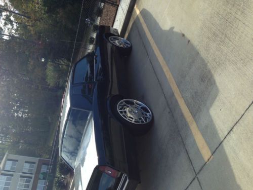 1985 monte carlo ss. all black red interior. 22 inch rims. call for questions