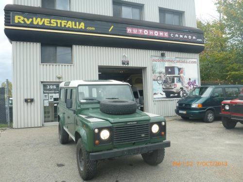 Green land rover defender 110 4-door wagon (1996) from germany