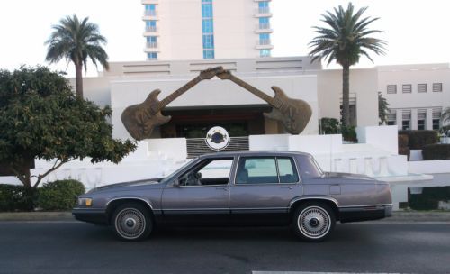 1992 cadillac deville pure luxury, all leather, low miles! make offer!