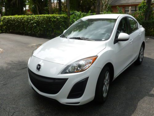 Mazda 3 white/ grey cloth int., 35,600 well maintained miles 4 dr sedan/tinting