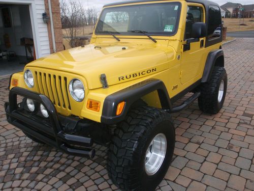 2006 jeep wrangler rubicon sport utility 4.0l 14k miles 3 tops yellow awesome!!!