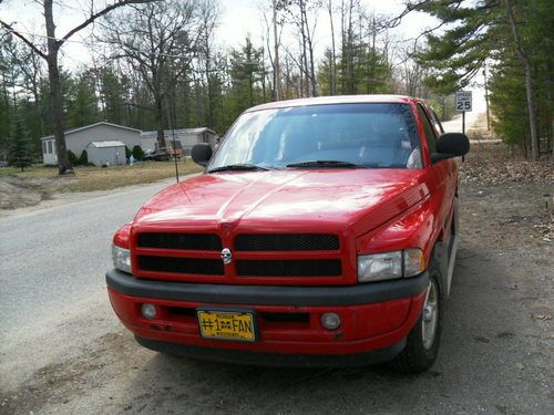Red 2 wheel drive 1998 dodge ram 1500 with camper shell