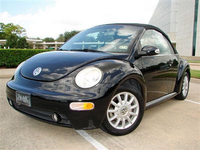 New beetle convertible,black on black,leather heated seats,runs gr8!!