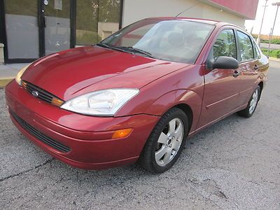 01 02 03 ford focus zts 4door , leather . looks and runs great !!!