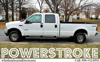Used ford f 250 crew cab powerstroke turbo diesel 4x4 pickup trucks we finance
