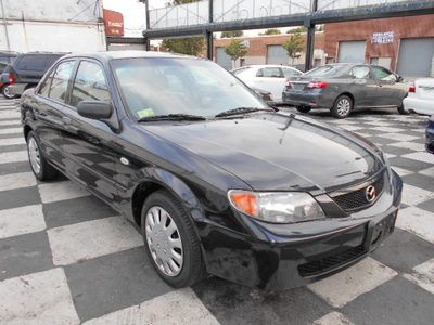 Beautiful gas saver protege dx one owner low mileage runs great