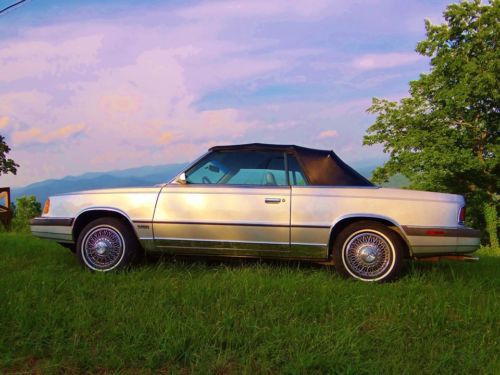 1986 chrysler lebaron convertible 4 cylinder turbo charged car. silver.