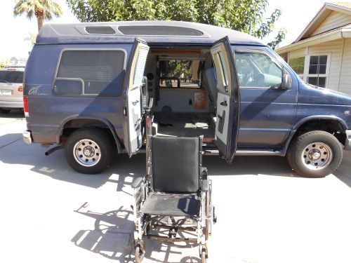 Ford ecoline van  equipped with remote wheel chair accessiblity