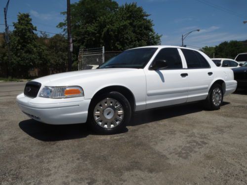 White p71 ex police 30k miles pw pl cruise cloth sts am/fm  nice
