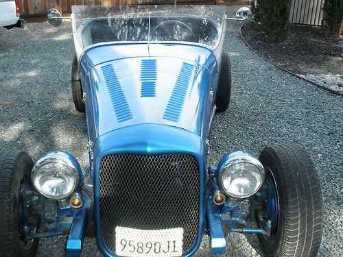 1927 roadster, fiberglass body,steel hood and front,4 cylinder,4speed datsun