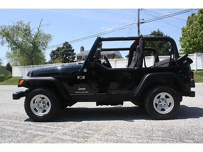 No reserve - 06 jeep wrangler x 6 speed manual- clean carfax 1 owner - ac -black