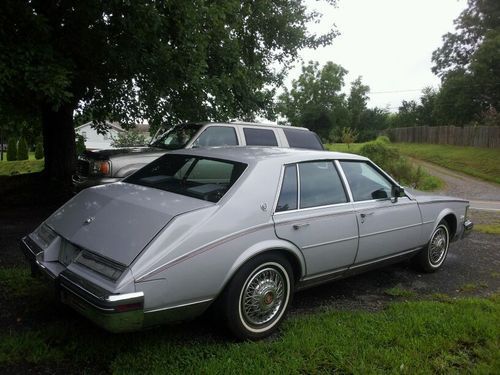 1984 caddy factory gray w red pin stripes