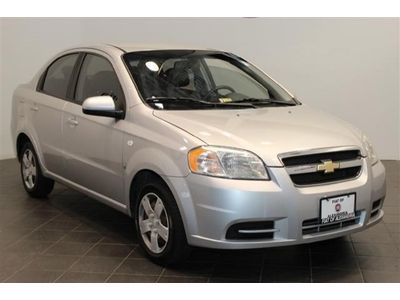 Terrific chevy aveo with low miles, silver four door cd stereo cruise 5 speed