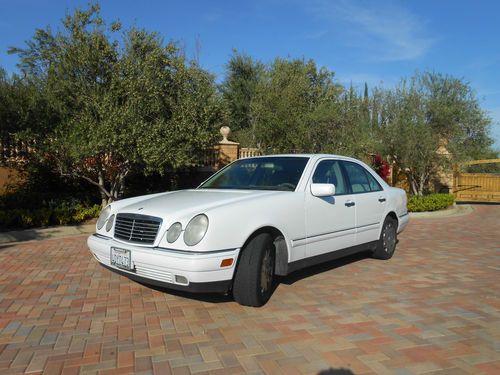 White~1999 mercedes-benz e320~v6,3.2l~moon roof~ice cold air~6 disc cd~power all