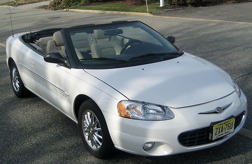 2001 limited convertible,white/white/blue top,70k miles,tip auto,loaded,ac,cdexc