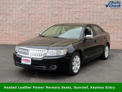 We finance!!! 3.5l v6 black w/ light stone leather sunroof moonroof