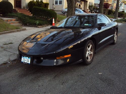 1995 unmolested trans am black 6 speed, bad motor, solid car.  zero warranties