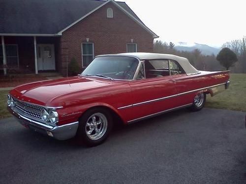 Red 1961 ford galaxie sunliner pace car driven by junior johnson