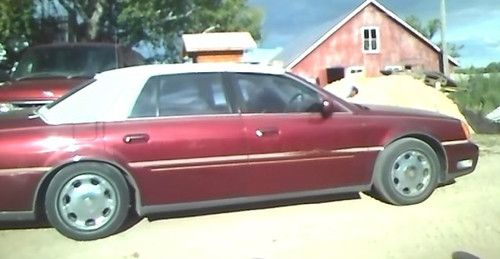 2001 red cadillac deville dhs