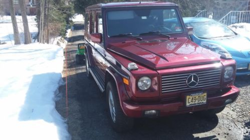 Maroon with black interior , low miles!!