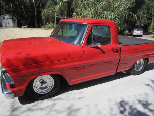 1968 ford f-100 short bed, new paint,uphostery,tires,new glass,302 roller motor