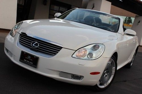 2004 lexus sc430 convertible. pearl white/blk. very clean. loaded. clean carfax.