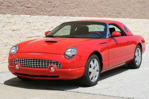 Red wih red and black interior chrome wheels 19k miles removable hardtop clean!!