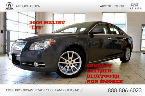 Carfax 1owner low miles gray on blk lthr moonroof super clean finance available